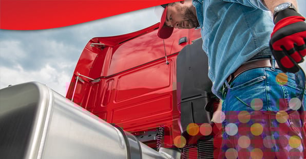 Man inspects truck for signs of employee fuel thef