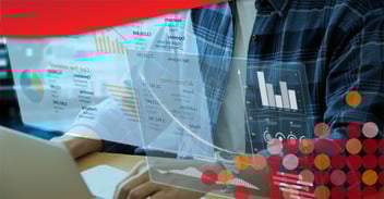 Man at computer considering maximizing your telematics ROI