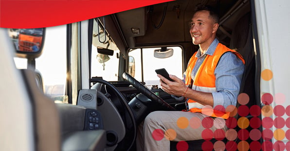 A team member discussing how to improve fleet driver experiences via a mobile device.